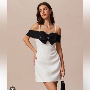 The White Off The Shoulder Bowknot Mini Dress